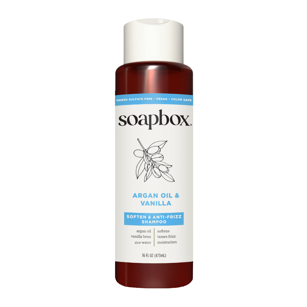 Soapbox Argan Oil & Vanilla shampoo bottle with white cap and burgundy liquid, 16 fl oz.
