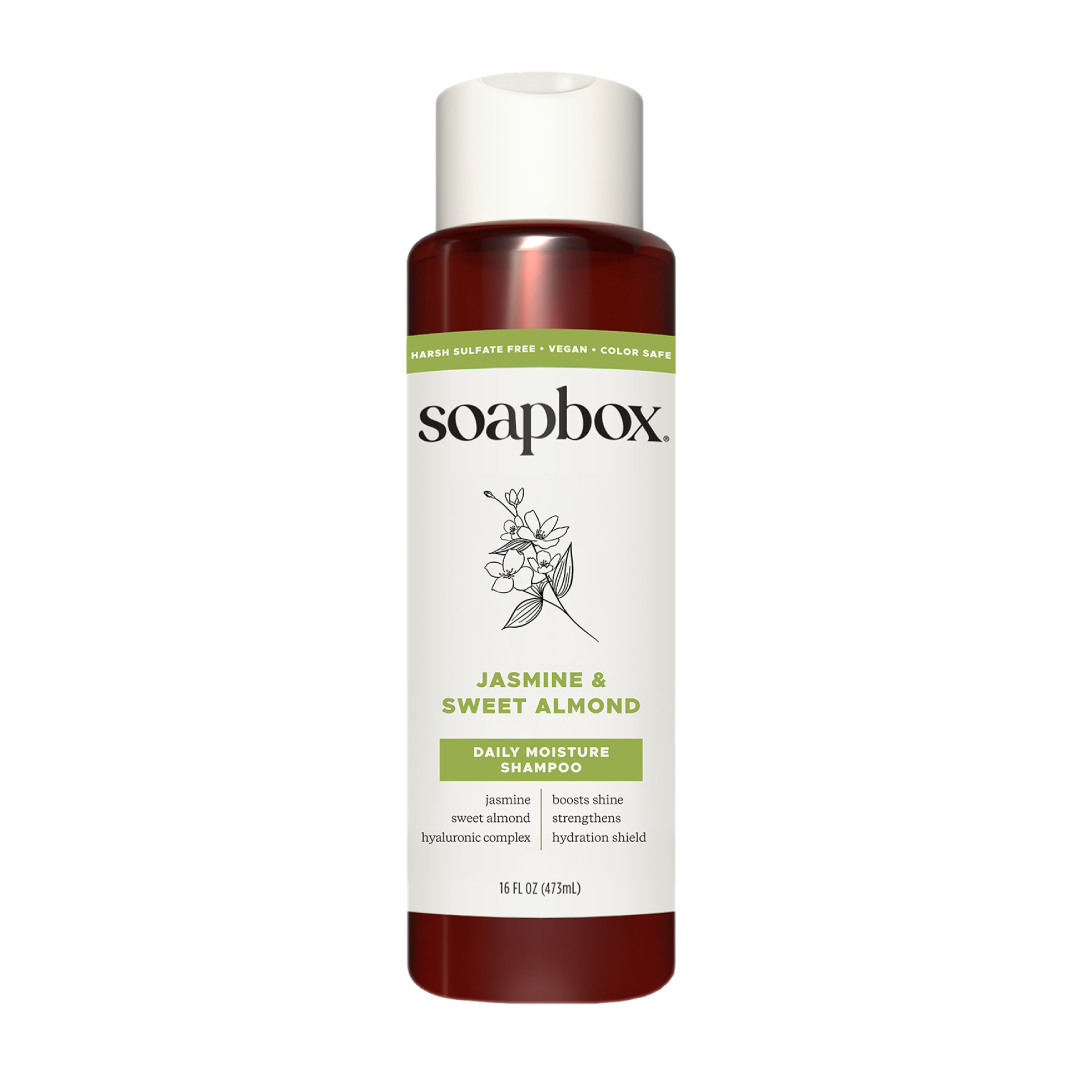 Soapbox Jasmine & Sweet Almond Daily Moisture Shampoo bottle with white cap and burgundy base, 16 fl oz.