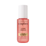 Soapbox Lychee Hibiscus hair fragrance mist in coral-pink bottle with white cap, 3.4 fl oz.
