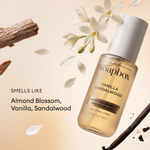 Soapbox Vanilla Sandalwood hair finishing mist in 3.4 oz bottle with white cap, displayed with sandalwood bark and white flow