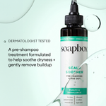 Dark glass bottle of Soapbox Scalp Soother pre-shampoo rinse-out treatment with turquoise and white label.