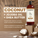 Soapbox coconut and shea deep moisture haircare in large amber pump bottle with coconut halves displayed.