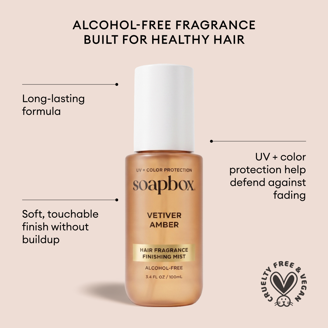 Soapbox Vetiver Amber hair fragrance mist in a 3.4 fl oz bottle with white cap on beige background.