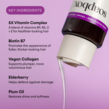 White bottle with purple cap dispensing clear liquid against pink background, displaying key ingredients text.