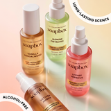 Soapbox Jasmine Pistachio Hair Fragrance Finishing Mist in pale green spray bottle with white pump top, displayed among other