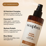 Soapbox Mane Tamer leave-in conditioner spray bottle with brown and cream label listing key ingredients including coconut oil