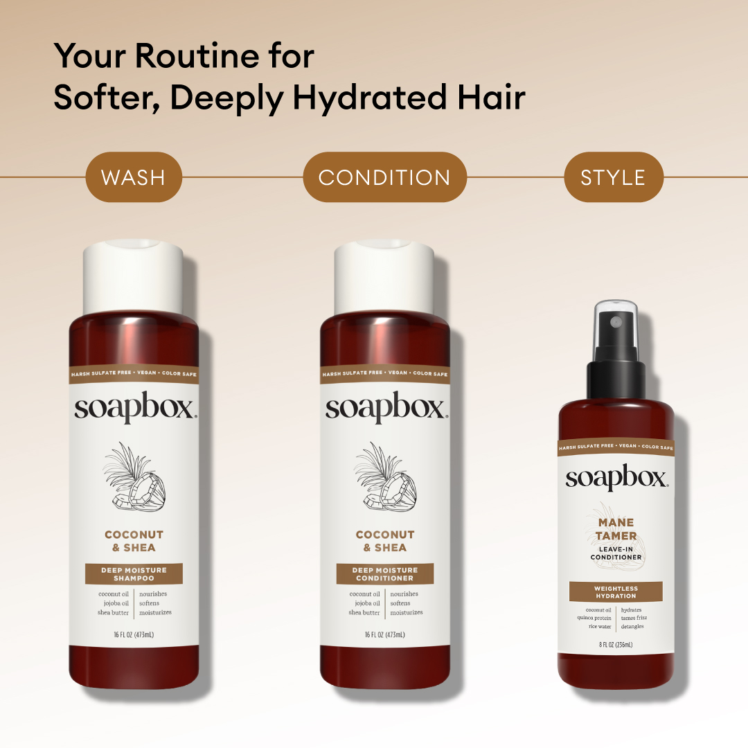 Soapbox Coconut & Shea Deep Moisture Shampoo bottle with white cap and dark red label on beige background.