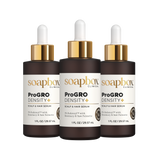 Three bottles of Soapbox ProGro Density Scalp and Hair Serum on a white background