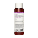 Dark amber conditioner bottle with white cap and purple label stating "Crave Fullness, Ditch Fallout" and product information