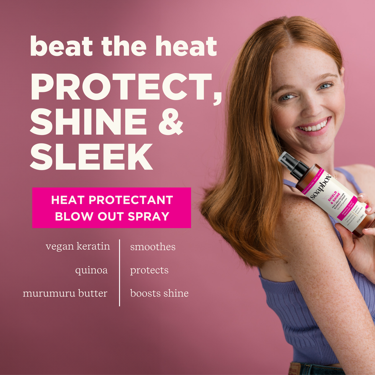 Woman with reddish-brown hair holding a heat protectant spray bottle against a pink background.