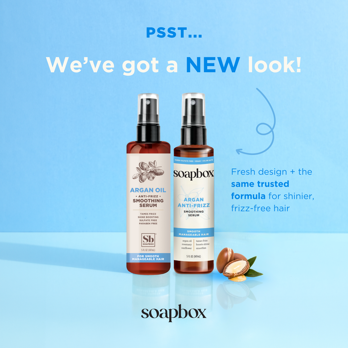 Two spray bottles of argan oil anti-frizz smoothing serum with black pumps and brown liquid, displayed with argan nuts on lig