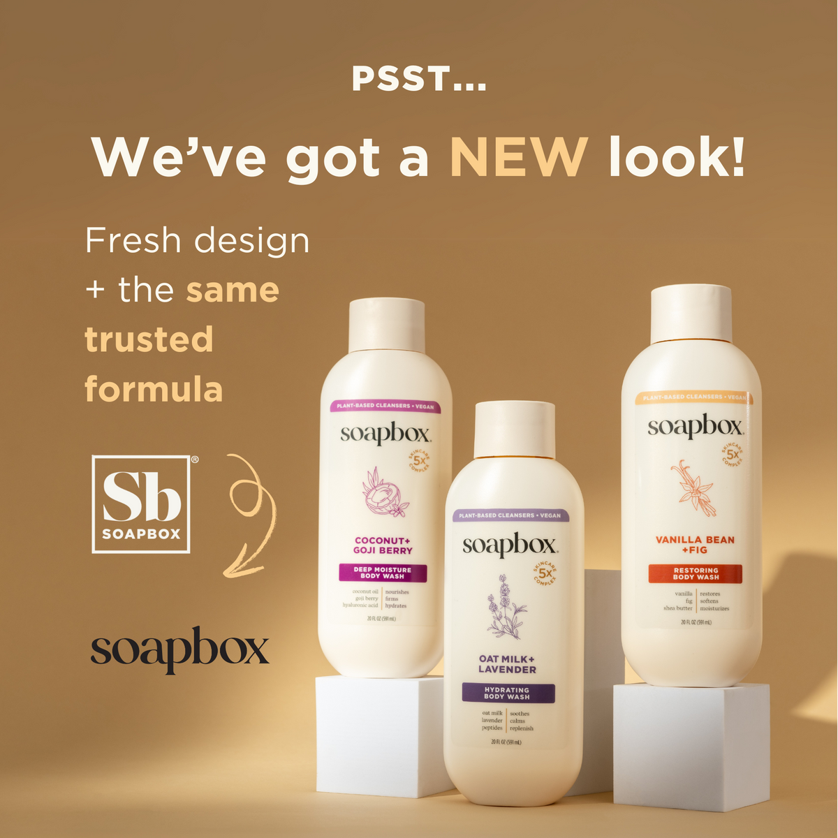 Three Soapbox body wash bottles on white pedestals against a tan background, including Vanilla Bean + Fig variant on the righ