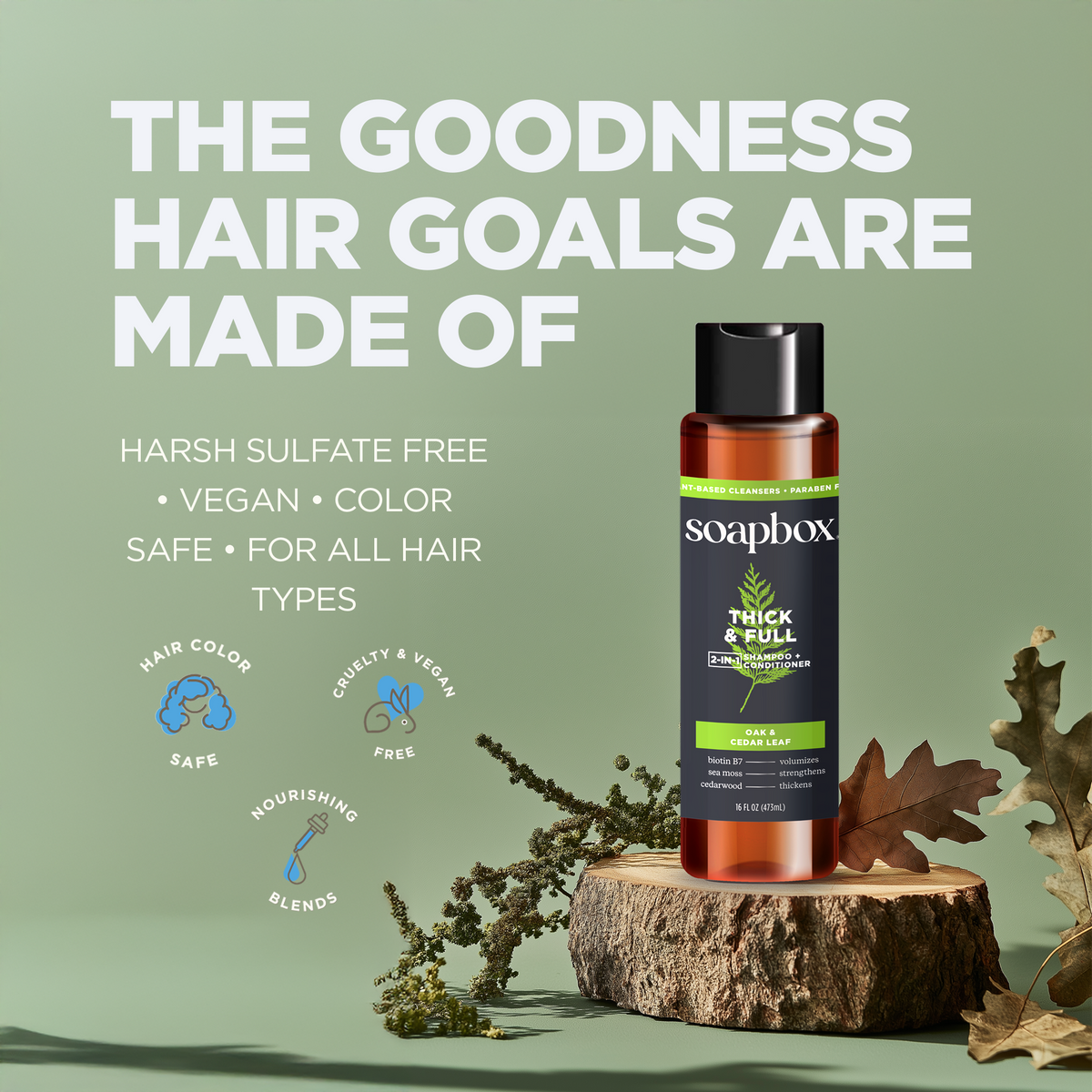 Soapbox Thick & Full 2-in-1 shampoo and conditioner bottle with black cap on wooden platform against sage green background.