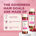 Two Soapbox shampoo and conditioner bottles with white caps on pink background with raspberries and product information.