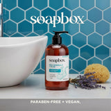 Amber glass bottle of Sea Minerals + Aloe liquid hand soap with black pump dispenser, displayed next to white bowl, yellow sp