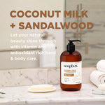 Amber glass pump bottle of Soapbox Coconut Milk + Sandalwood hand soap on marble bathroom counter with white soap dish and to