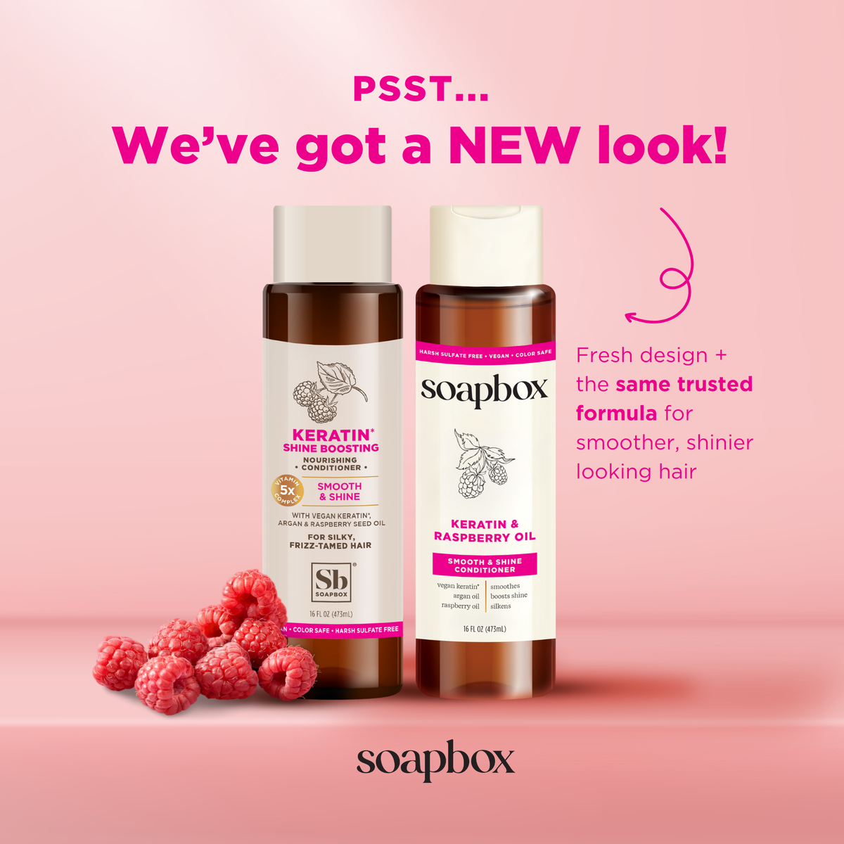 Two brown bottles with white caps on pink background surrounded by fresh raspberries, displaying keratin and raspberry seed o
