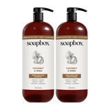 Two dark amber bottles with black pump dispensers labeled Soapbox Coconut & Shea Deep Moisture Shampoo and Conditioner, 33.5 
