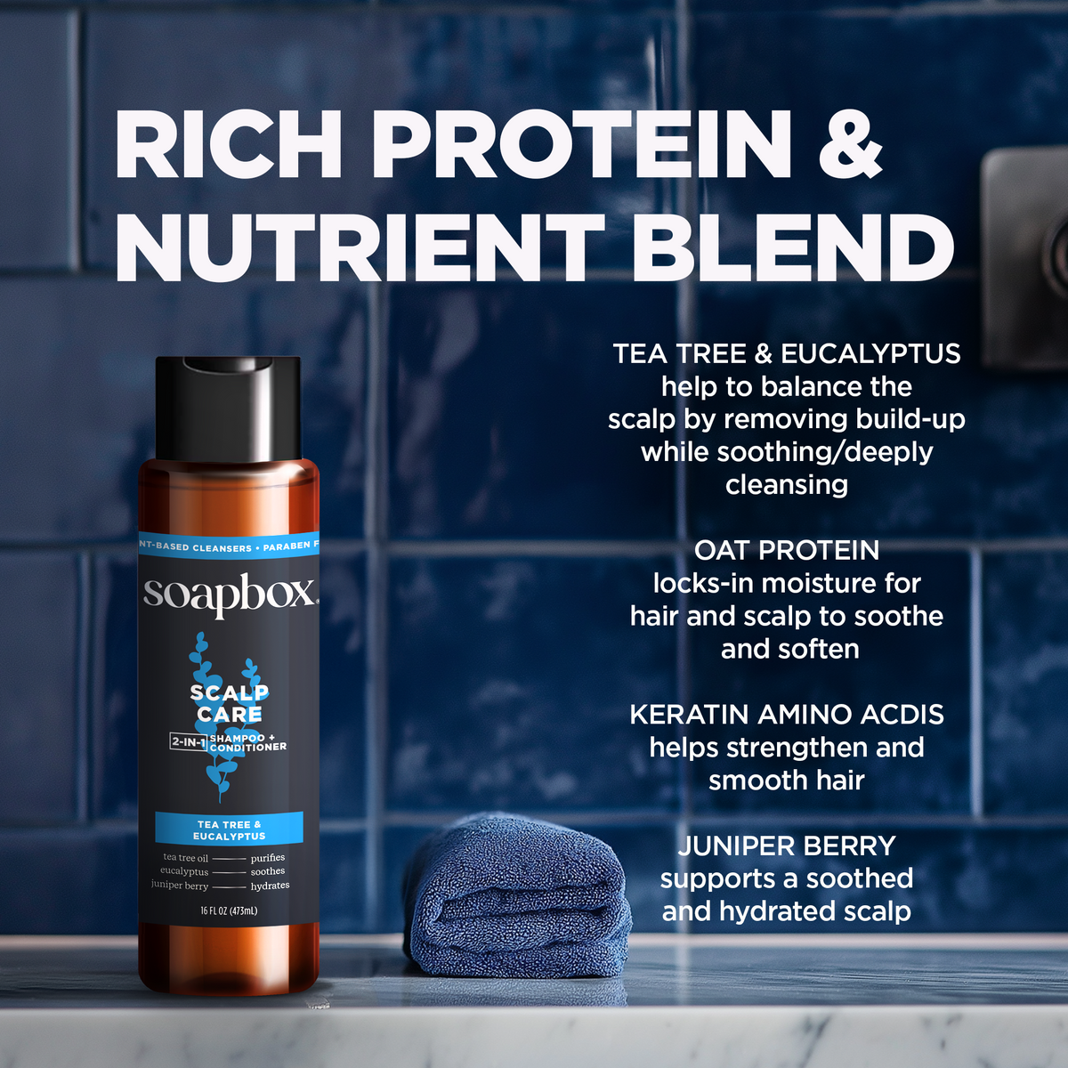 Soapbox Scalp Care 2-in-1 shampoo and conditioner bottle with blue washcloth on marble surface.