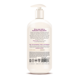 Cream-colored pump bottle of body lotion with beige label featuring product information and ingredient list.