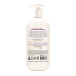 Cream-colored body lotion bottle with pump dispenser and product information label on front.