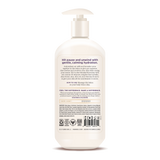 Cream-colored pump bottle of body lotion with label describing oat milk and lavender hydrating formula.