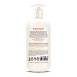 Cream-colored pump bottle of body lotion with beige label containing product information and ingredients list.