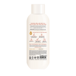 Cream-colored body wash bottle with white cap and printed product information and ingredient details on label.