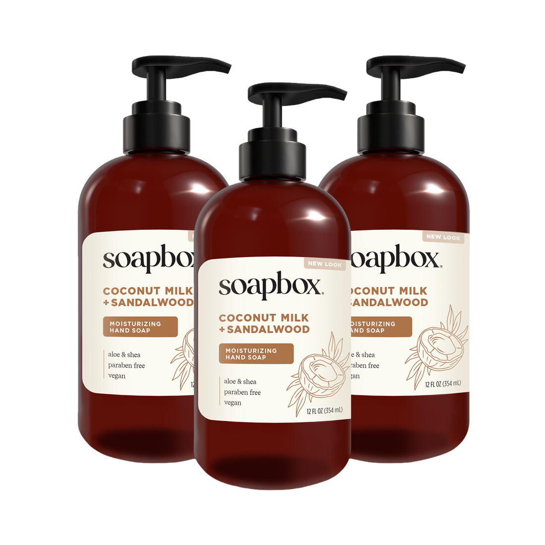 Three dark amber bottles of Soapbox Coconut Milk and Sandalwood liquid hand soap with black pump dispensers.