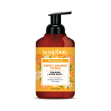 Red and amber bottle of Soapbox Sweet Orange Citrus foaming hand soap with black pump dispenser and orange citrus label.
