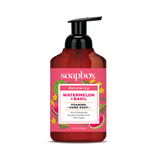 Red and pink foaming hand soap bottle with black pump dispenser, labeled watermelon and basil scent.