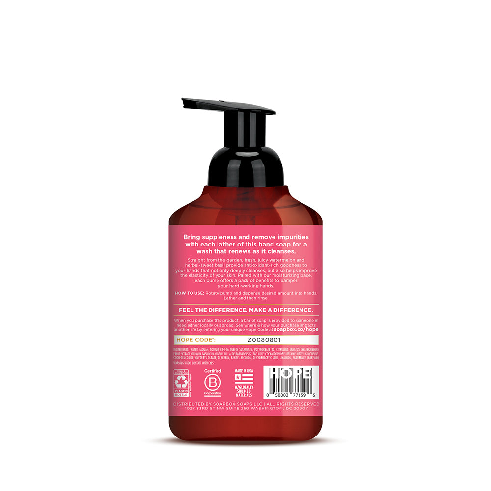 Pink and red foaming hand soap bottle with black pump dispenser and product information label on back.