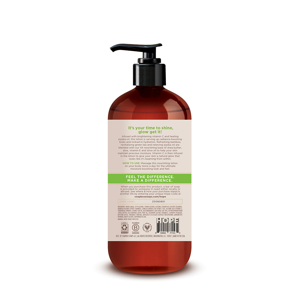 Dark red pump bottle with beige and green label containing body lotion with bamboo and green tea ingredients.