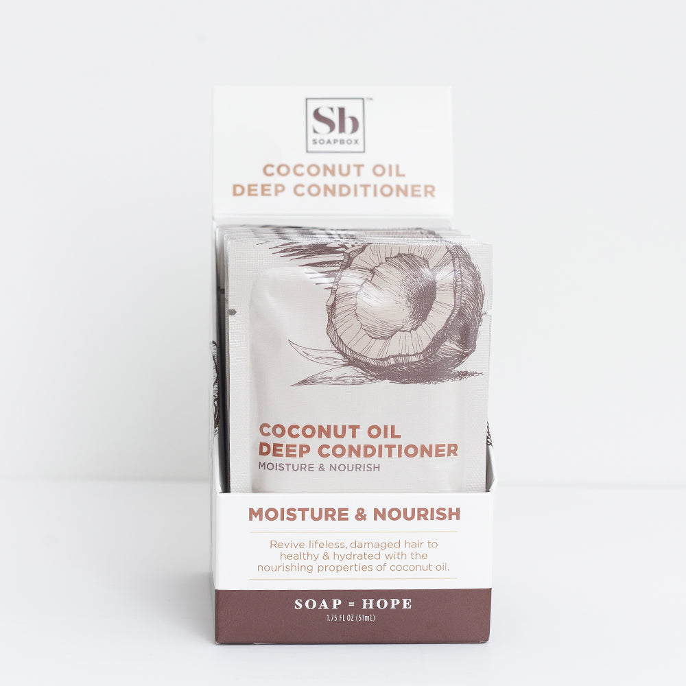 Soapbox Coconut Oil Deep Conditioner sachets with illustrated coconut and product information on white packaging.