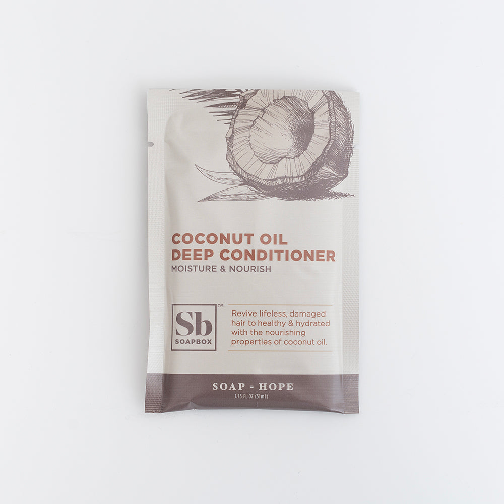 Single-use sachet packet of Coconut Oil Deep Conditioner by Soap Hope with beige and brown labeling and coconut illustration.