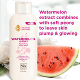 Cream-colored body wash bottle with peony flowers and watermelon slice displayed alongside.